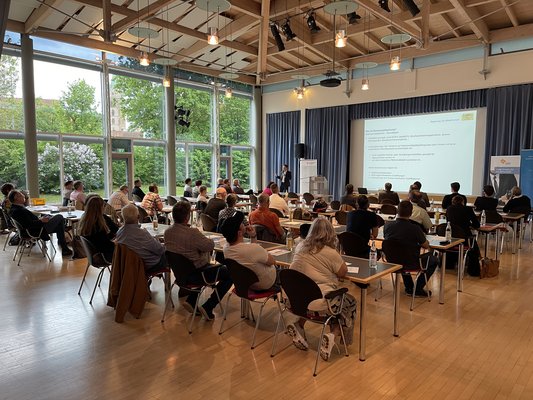Vortrag mit Publikum im Saal